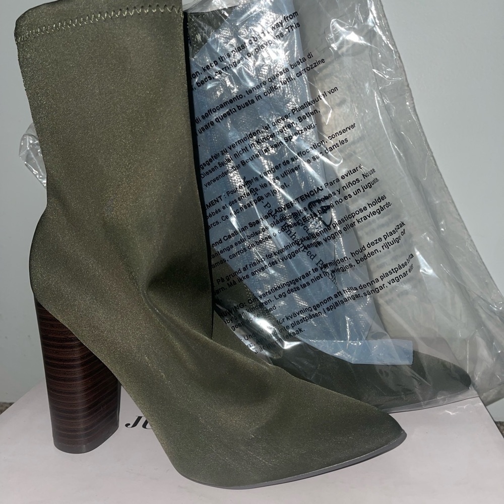 Dark green fitted sock like booties